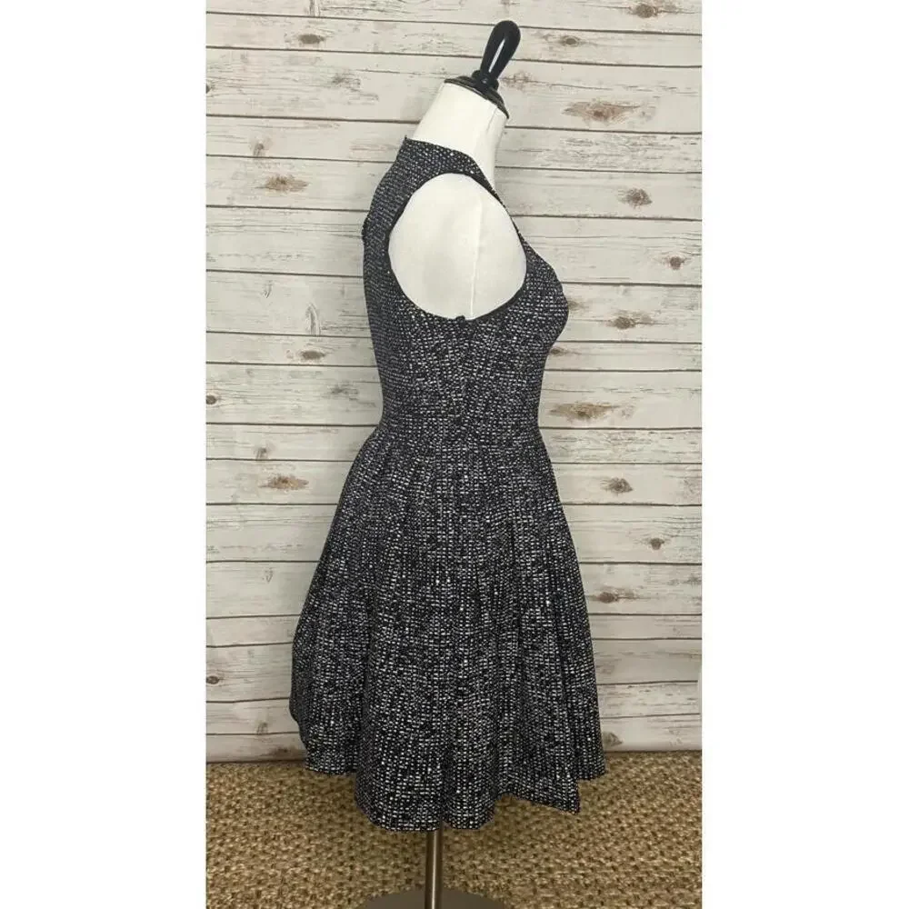 cinq a sept black/white sleeveless cutout fit and flare cocktail dress Size 0